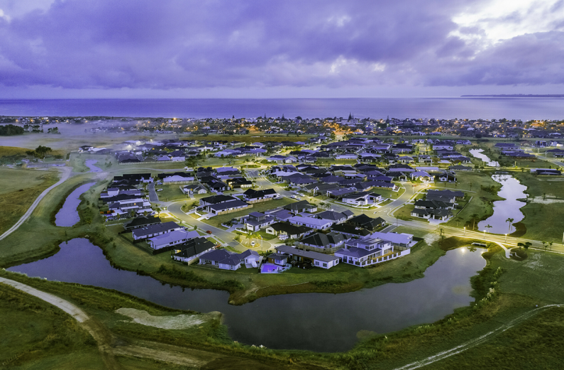 Palm Springs residential area in Papamoa showing housing surrounded by waterways