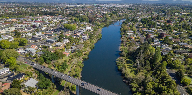 Drone shot of bridges crossing the Waikato river in Hamilton
