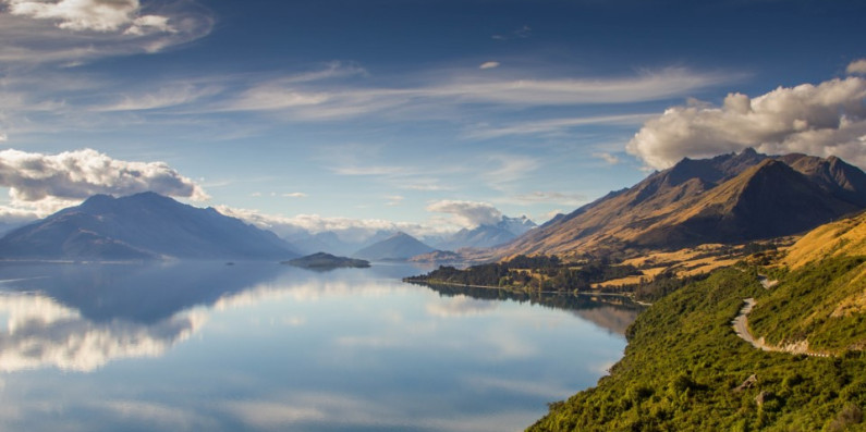 Lake with mountains in the background