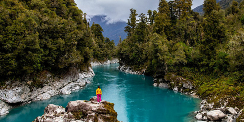 A person looking out over Hokitika Gorge.